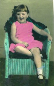 Lynn aged 4, confident that one day she would be a writer!